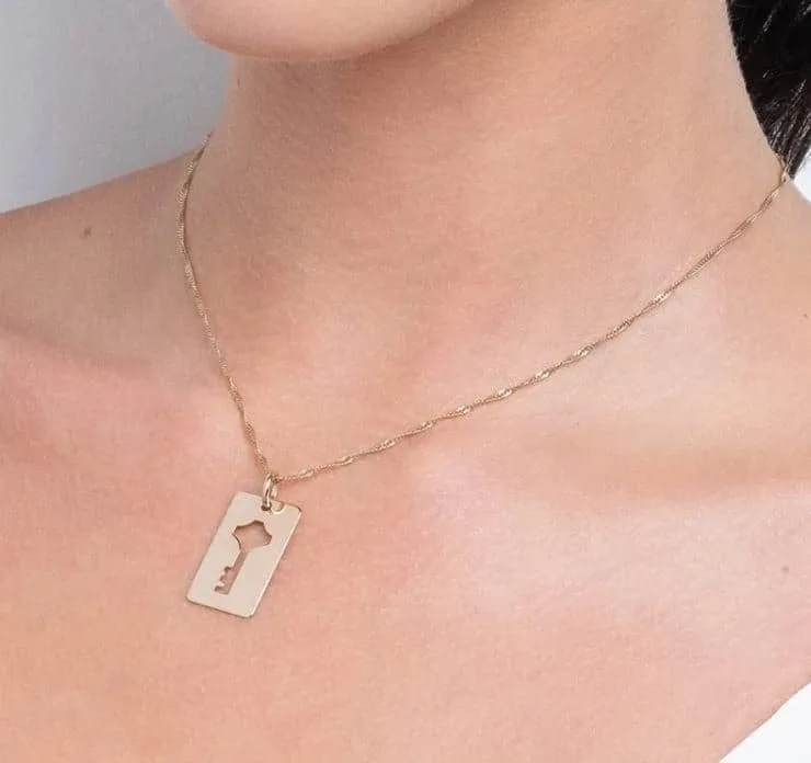 Pingente Rommanel cara metade com peça retangular formato chave vazada e outra no formato chave, 2,8 cm x 1,5 cm - Cod 542405 - Imagem 4